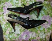50's, 60's, black patent slingbacks by Palizzio. 5 1/2 B
