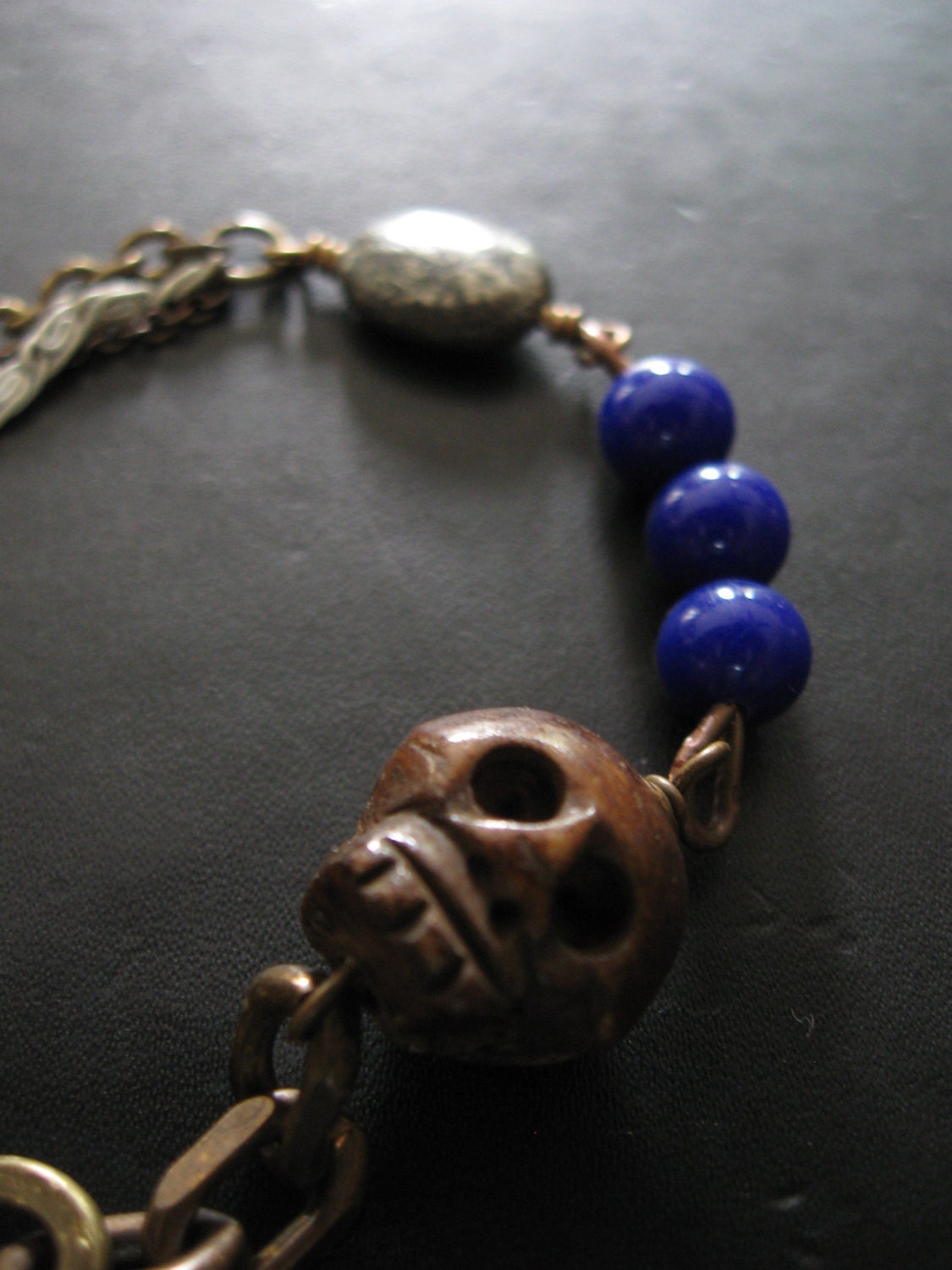In Effigy - Bone Skull Blue Glass Pyrite and Upcycled Chain Assemblage Bracelet