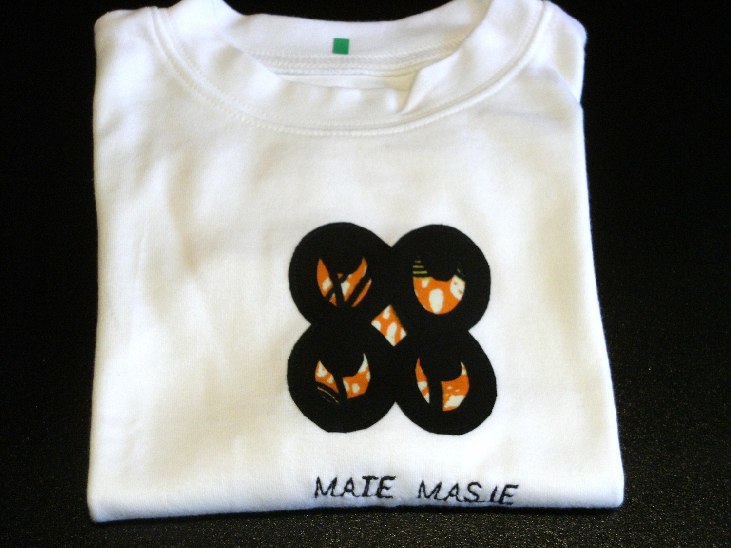 White Baby's T-shirt with Adinkra symbol size 9-12 months