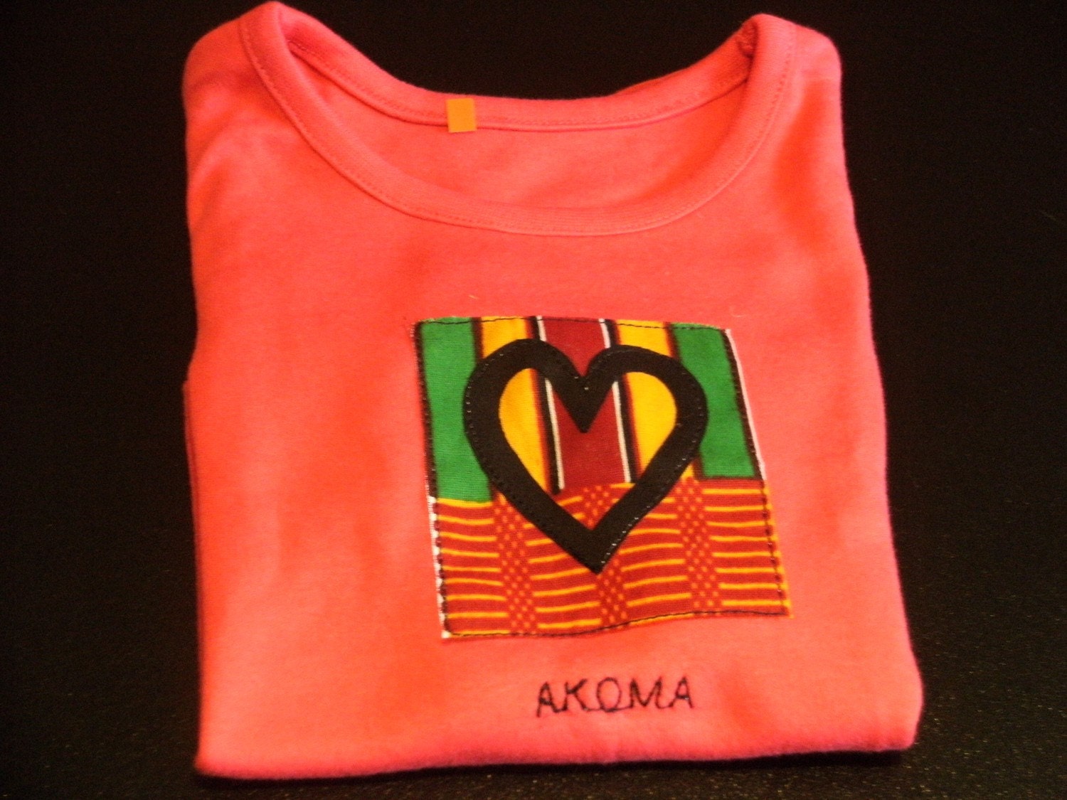 Cerise Baby's T-shirt with Adinkra symbol size 6-9 months