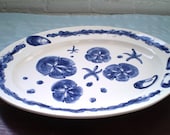 Sand dollar lg.. oval platter