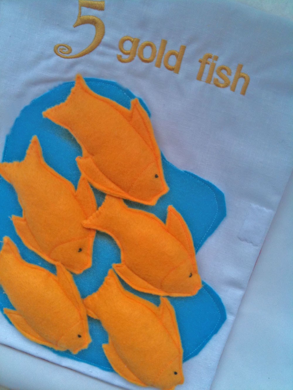 Montessori Based Fold Out Fabric Nature Counting Book - A must for any preschooler.