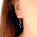 Corkscrew earrings. Sterling silver tendrils.