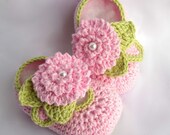 Crochet pattern booties with flower and pearl centers pdf