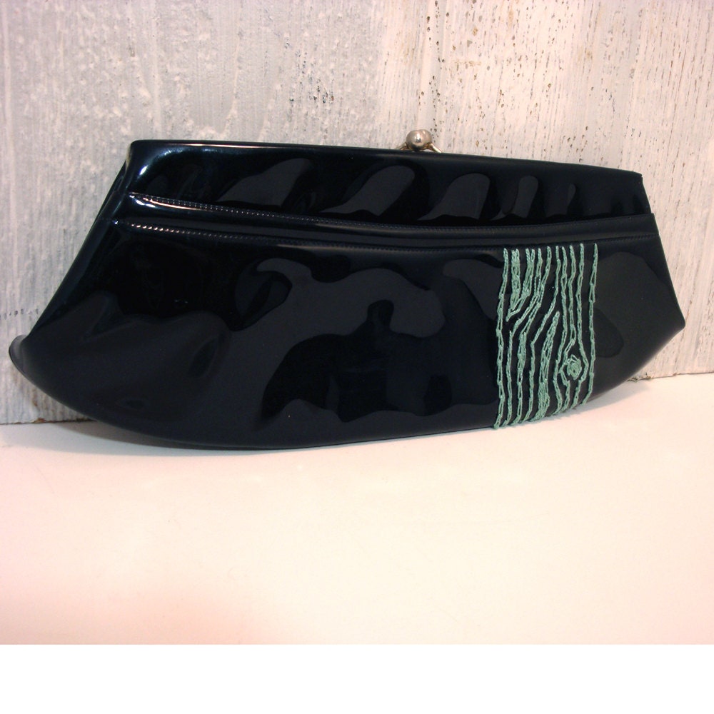 peacock blue tree clutch