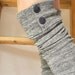 Gray knit military leg warmers