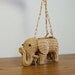 1970s straw elephant hanging planter / hanging basket
