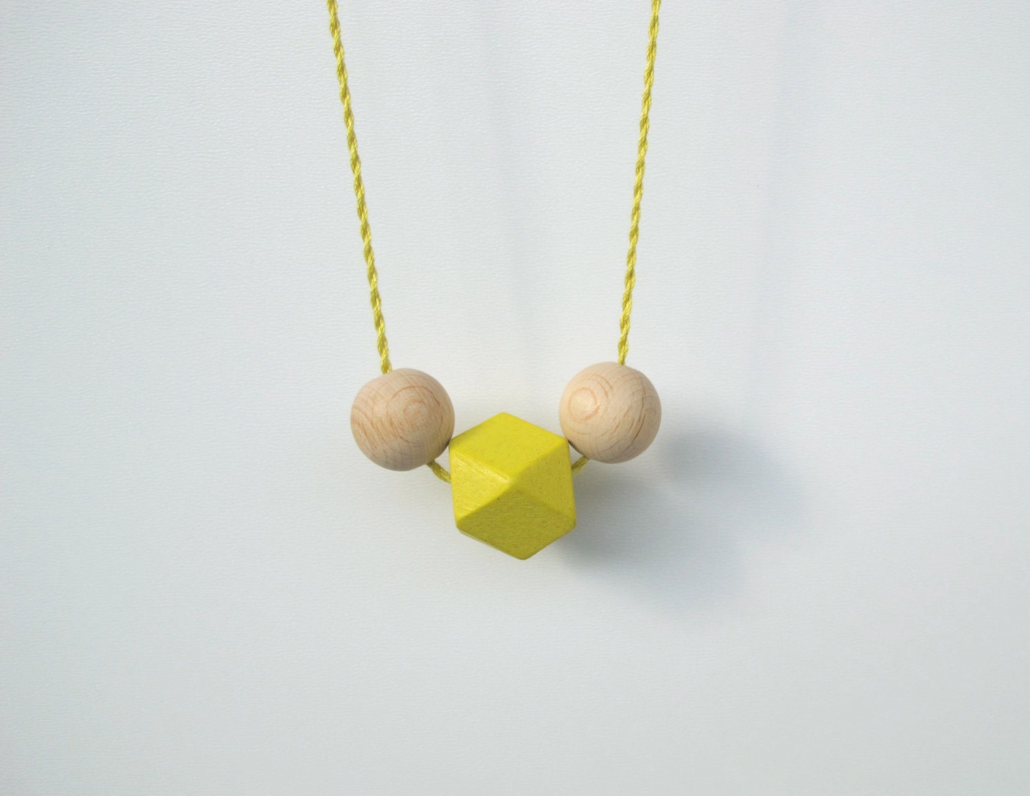 geometric necklace with faceted wooden neon beads silk string