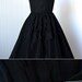 vintage 1950's dress ...pretty BETTY BARCLAY black ruffled bustle back full skirt shoulder skimming shawl collar pin-up cocktail party dress