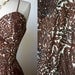 vintage 1950's dress ...fabulous folk NOVELTY PRINT cotton with ladies pleated bust full skirt pin-up party dress encrusted with rhinestones