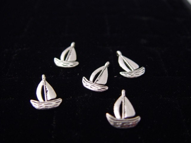 Five Cute sailboat charms