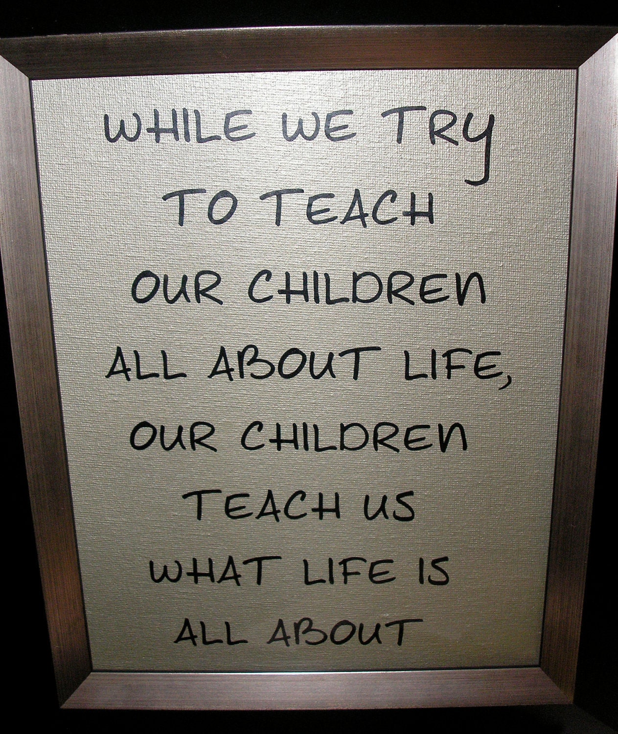 While we try to teach our children all about life, our children teach us what life is all about Canvas Board 8"x10"