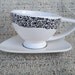 Assymetrical Teacup and Saucer Set