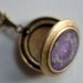 Art Locket Necklace featuring a Honey Bee - The purple, iconic pendant looks vintage with a romantic flair