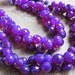 Vibrant Purple Chalcedony Faceted Onion
