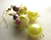 Lampwork earrings  ... flowery lampwork beads with purple and yellow pearls ... the sun's a yellow pearl