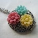 I heart primaries ... flowery filigree locket