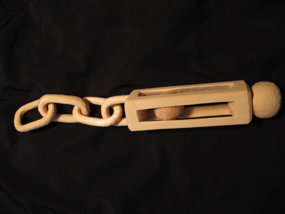 Whimsical Carved Wooden Ball in Cage with Chain by Graveyardbunny
