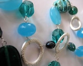 ON SALE . Oceanic Dreams . Turquoise, teal and blue glass, crystal, pearl and chalcedony beads, wire wrapped in sterling silver