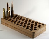 Standard ammo can liner for transporting .50 BMG cartridges