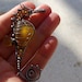 GOLDEN YELLOW seahorse wire wrapped seaglass pendant.