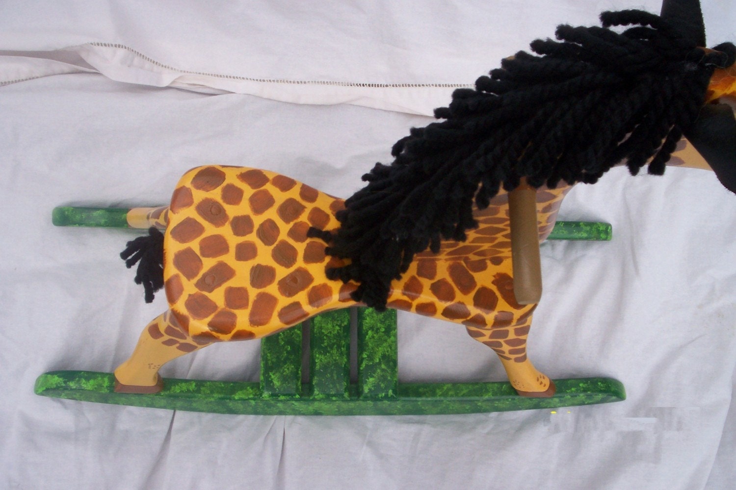 wooden rocking horse or giraffe
