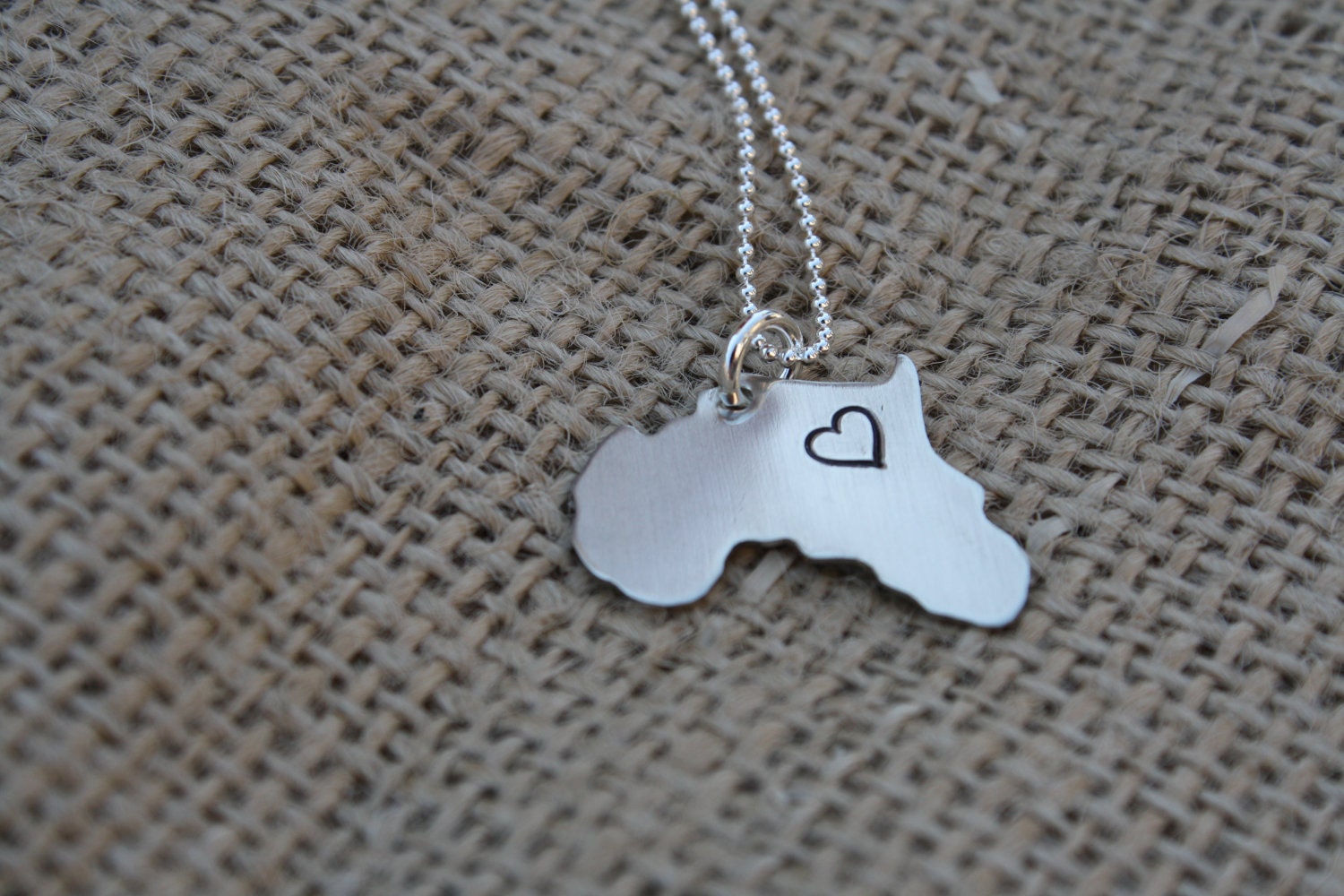Hand Stamped Silver Charm on a Sterling Silver Chain - Africa