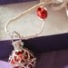 Caged Harmony Ball Bright Red