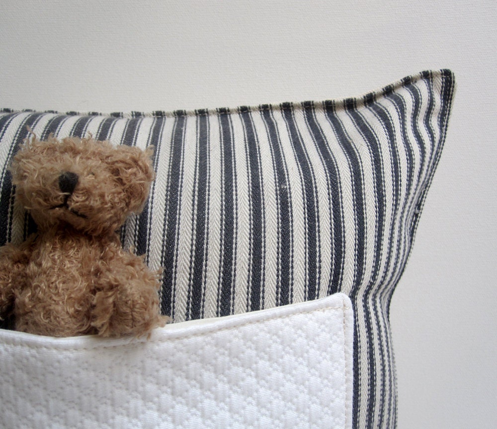 pocket pillow with bear in ticking