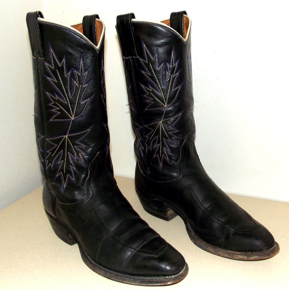 Black leather Nocona cowboy boots with white and purple stitched design