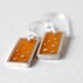 That Feeling Earrings orange resin and sterling silver, dots