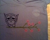 OWL (Abe) on cherry blossom branch