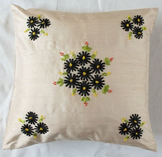 Cream throw pillow with black floral ribbon work ON SALE