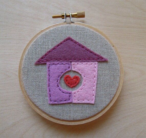 HOME embroidered wall art in carnation