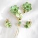 Vintage Juliana, DeLizza and Elster, D&E Peridot Lime Green Rhinestones, Givre Molded Lava Glass, and Enamel Flower Brooch and Earrings Dem