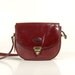 French Designer Red plum leather cross body saddle bag