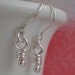Un. Tiny Earrings. Sterling Silver Rustic Dangle Knots