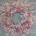 Statice dried flower wreath with soft shades of pink and lavender