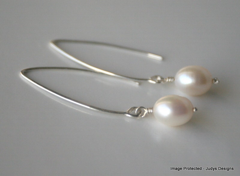 White pearl earrings, sterling silver drop style