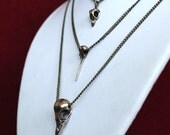Bird Skull Necklace Cluster in Bronze