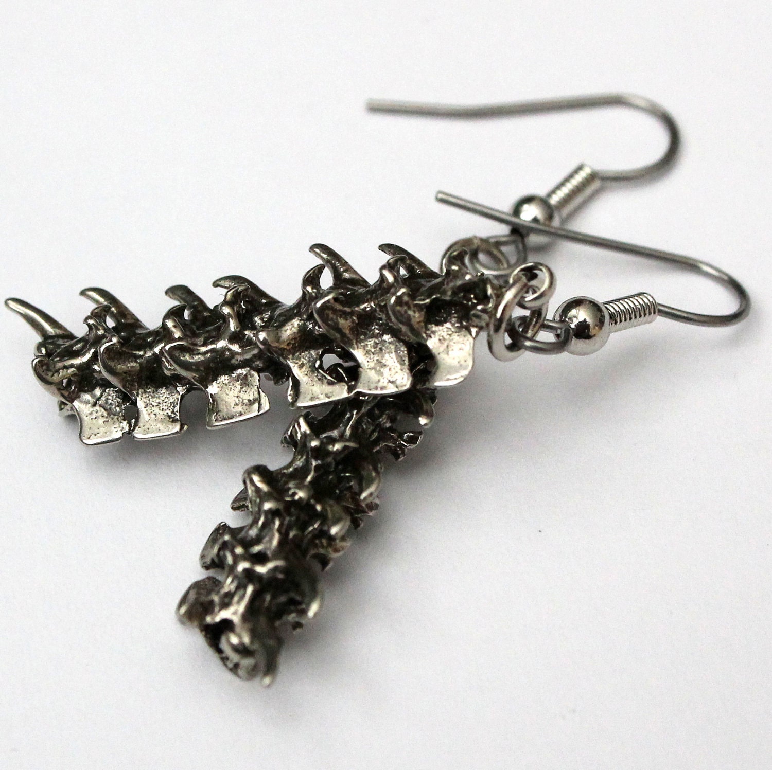 Snake Vertebrae Earrings in White Bronze