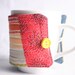 coffee mug cozy, reuseable mug cozy, quilted fabric red, orange, yellow: Ladybug