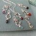 Set of 7 Chakra Pendants with semi-precious stones