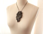 CLEARANCE SALE - A Million Falling Leaves Necklace in Antiqued Brass