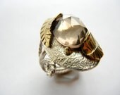 Sterling silver, rose cut smoky quartz, in brass leaf setting size 7 PRICE REDUCED