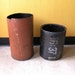 Steampunk Trash Can or planter container. Black, white, yellow. round. Recycled Metal