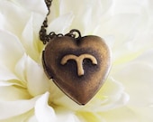 april birthday . zodiac heart locket necklace . bronze . aries