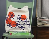 Recycled cotton Fair Trade tote bag screenprint geometric pattern orange and dark violet ink