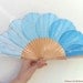 Turquoise bublles. Hand-painted fan. A
