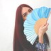 Turquoise bublles. Hand-painted fan. A